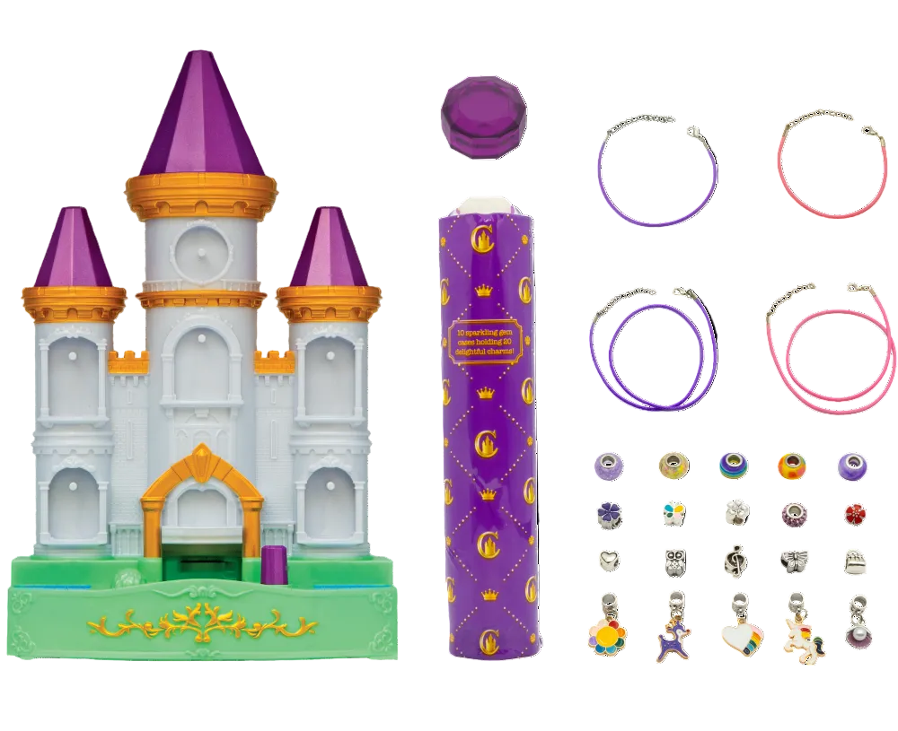 Toy castle with charm bracelet set and additional charms on a white background