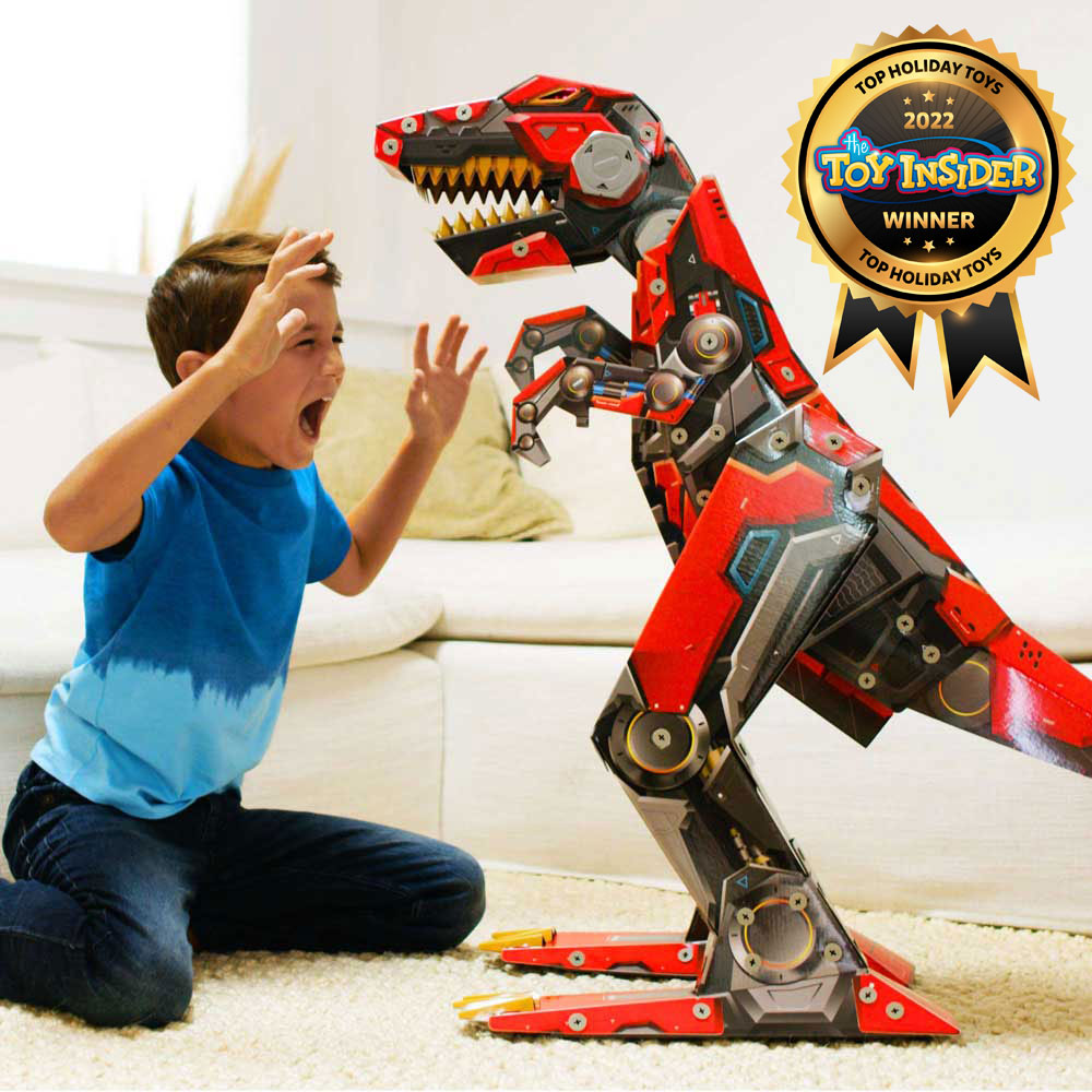Child holds his hands up and roars at the Robo-Max T-Rex. Toy Insider Top Holiday Toy Winner.